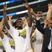 Michigan junior Tim Hardaway Jr. and his team wave to the crowd as they celebrate beating Florida to win the NCAA South Regional Championship and advancing to the Final Four at Cowboys Stadium on Sunday, March 31, 2013. Melanie Maxwell I AnnArbor.com